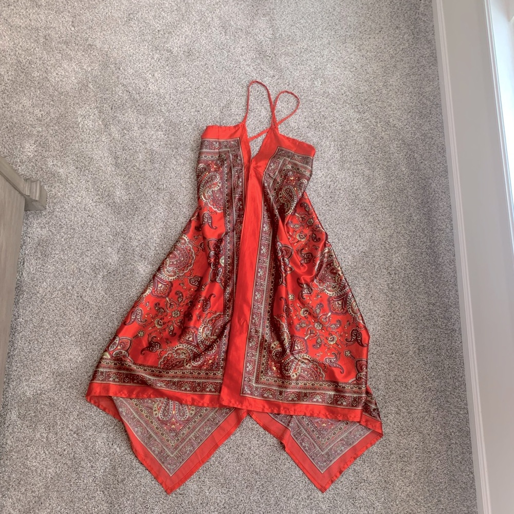 Long dress with angled ends. Beautiful, bright vibrant colored, zipper back